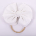 Detail of white waffle fabric baby bow headband with high-elastic nylon band - White Crepe Style (#17)