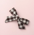 Close-up of baby girl hair clip featuring a vintage brown plaid checkered bow design - Dark Coffee Plaid (#1)
