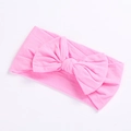 Soft nylon infant headband featuring a large candy pink bow for baby girls - Water Pink