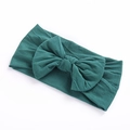 Soft nylon headband for babies featuring a dark green knitted fabric large bow design - Dark Green