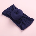 Cute dark blue knitted donut baby headband with cable knit texture for infants - Navy Blue