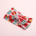 Detail view of pink floral bow headband for babies made from soft elastic knit fabric - Cartoon Red Flower