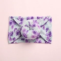Close-up of soft purple floral print on grey baby headband with donut knot detail - Mysterious Violet