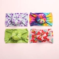 Detail of four baby headbands featuring floral and tie-dye patterns with donut knots - Random Color