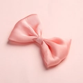 Close-up of pink satin bow hair clip showing smooth silk texture and twill weave detail - Pink (11)