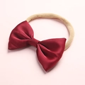 Detailed view of dark red satin bow headband with soft nude elastic nylon band for babies - Deep Red (5)
