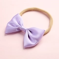 Detailed view of lavender satin bow hairband with high-elastic nude nylon strap for babies - Lavender (17)