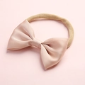 Detail of baby headband with a satin champagne pink bow and soft nylon elastic band - Champagne Pink (18)