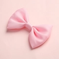 Close-up of pink satin bow hair clip showing detailed fabric texture and elegant craftsmanship - 19