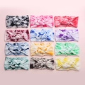 Set of 12 tie-dye infant headbands with soft nylon fabric and twisted knot design - Random Color
