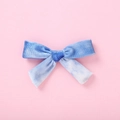 Detailed view of bohemian blue tie-dye velvet hair bow clip for girls on pink background - Blue White Gradient Tie-Dye Style (4)