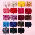 Detailed collection of 19 colorful velvet baby headbands with large bows in a grid layout - Random Color