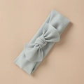 Close-up of light blue elastic headband featuring a large soft textured fabric bow - Light Blue Style (5)