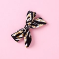 Detail of leopard print velvet bow hair clip for girls with soft animal texture - Black White Ginger Leopard