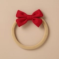Close-up of red fabric bow hair tie with highly elastic beige band for kids and babies - Red Fabric Bow (10)