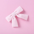 Close-up detail of soft pink velvet bow hair clip with premium fabric texture and craft - Approximately 8cm x 7cm / Beige