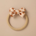 Close-up of beige vintage bow hair tie with orange polka dots and elastic band - Beige Orange Semicircle Polka Dot Bow (16)