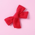 Close-up of red cotton plaid bow hair clip showing detailed weave texture and pattern - 4 Red