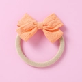 Orange jacquard bow headband for infants featuring soft nylon elastic baby hair band accessory - Light Orange