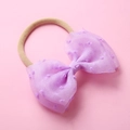 Détail du bandeau bébé avec nœud en tulle violet à pois et bande en nylon sans couture - Mauve Clair