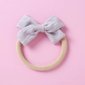 Detail of lavender jacquard bow headband for infants with elastic nylon band - Gray