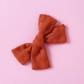 Burnt orange cotton jacquard hair bow clip with textured polka dot pattern - Orange Red