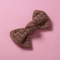 Detail of dark brown knitted bow hair clip showing handmade plaid wool texture on pink background - 10*6 cm / Dark Brown