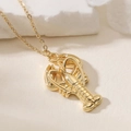 Collier avec pendentif homard doré à l'or fin présentant des détails précis et chaîne fine - Style Homard Poli (25144)