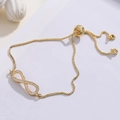 Elegant 18K gold plated infinity bracelet with white cubic zirconia and adjustable chain - Infinity Style (32316)