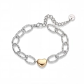 Détail de la chaîne martelée en acier avec pendentif cœur doré et étiquette S.STEEL - Style Pendentif Coeur Épissé Or et Argent (32369)