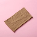 Detailed view of caramel seersucker fabric texture on a soft elastic baby nylon headband - Dark Coffee
