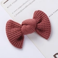 Close-up of deep pink waffle knit bow hair clip with thick texture and knot detail - Waffle Texture Bow / Deep Pink