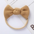 Detail of khaki waffle knit bow headband with highly elastic seamless nylon hair band - Khaki