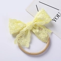 Detail of bright yellow embroidered lace bow on soft nylon headband for babies - 10*7CM / Bright yellow