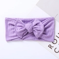 Detailed texture of purple ribbed knit headband with a large bow for infants - 17.5*7.5 cm / Purple