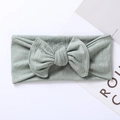Detailed texture of mint green ribbed knit fabric baby headband with large bow accent - 17.5*7.5 cm / Bean Green