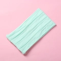 Detail showing the cable knit texture and soft jacquard fabric of the mint green baby headband - 15.5*8.5cm / Emerald Green