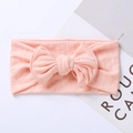 Close-up of pink jacquard ribbed knit baby headband with a large decorative bow - 17.5*7.5 cm / Light Pink