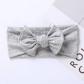 Close-up of gray ribbed knit baby headband featuring a large bow on white background - 17.5*7.5 cm / Gray