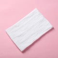 Detailed close-up of white cable knit nylon baby headband with soft braided texture - 15.5*8.5cm / White