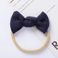 Detail of dark blue waffle knit bow with a beige high-elastic seamless headband - Dark Blue