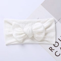 Detail view of a white knitted baby headband featuring a large bow and ribbed texture - 17.5*7.5 cm / White