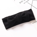 Detalle de diadema negra de algodón acanalado para bebé con lazo y tejido suave elástico - Negro