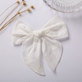 Detail view of 6 inches white jacquard cotton bow hairpin with elegant textures - White