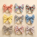 Set di fasce per neonati con fiocchi in cotone floreale e leopardato su nylon morbido - 10*10 cm / Colore Casuale