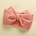 Close-up of pink waffle knit texture and handmade large bow detail on baby headband - 17*9 cm / Peach Yellow