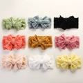 Lot de 9 bandeaux pour bébé avec grands nœuds élastiques en plusieurs couleurs vives - 16X8cm / Couleur Aléatoire
