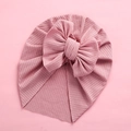 Detail of baby turban headwrap with large bow in soft ribbed dusty pink fabric - 18x21cm / Deep Pink