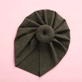 Detail of dark green ribbed knit baby turban with donut knot on pink background - Army Green
