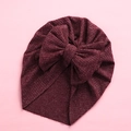Detailed texture of dark red ribbed baby turban hat featuring a large soft knit bow - 18x21cm / Burgundy